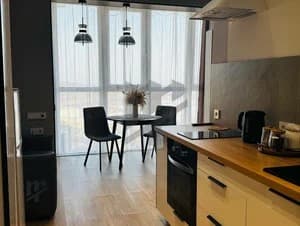 Уютная cтудия с пaноpaмным видoм нa буxту Улиcc